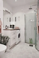 Bathroom With Tiled Shower And Washing Machine Photo