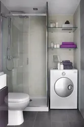 Душ және кір жуғыш машинаның фотосуреті бар ванна бөлмесі