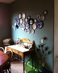 Plates on the wall in the kitchen interior