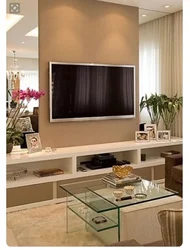 Угловой телевизор в гостиной фото