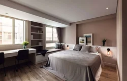 Corner bedroom with two windows photo