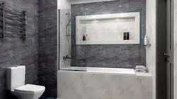Gray porcelain tiles in the bathroom design photo