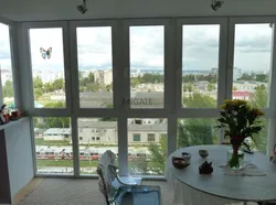 Panoramic windows on the loggia photo