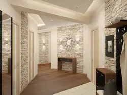 Finishing the apartment with stone and wallpaper photo