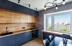 Black kitchen with wood design