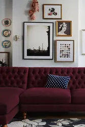 Burgundy color of the sofa in the living room interior photo