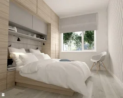 Small Bedroom With A Large Bed And Wardrobe Photo