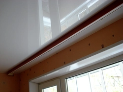 Photo of a cornice on a suspended ceiling in the kitchen