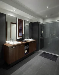 Bathroom design with dark furniture