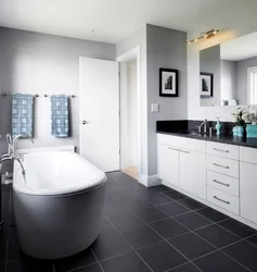 Bathroom design with dark furniture