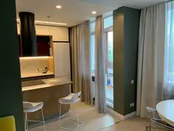 Дизайн интерьера кухни с балконной дверью