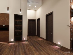 Apartment with dark doors and light floor photo