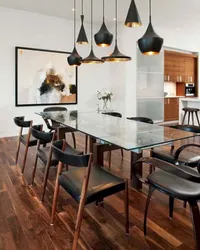 Black chairs in the kitchen interior photo