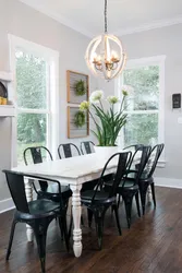 Black chairs in the kitchen interior photo