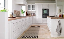 Marble and wood in the kitchen interior photo