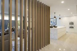 Slatted partition in the living room interior
