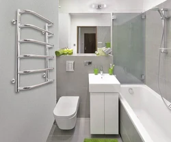 Design of a small bathroom with a toilet in gray tones