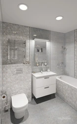 Design of a small bathroom with a toilet in gray tones