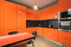 Kitchen In Orange-Gray Tones Photo