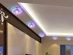 Suspended ceiling in the living room with lighting and chandelier photo