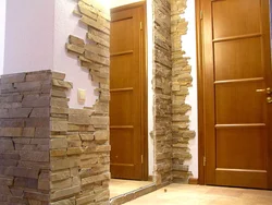 Artificial stone for interior wall decoration in the hallway in the interior