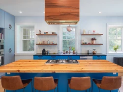 Blue Kitchen With Wooden Countertops In The Interior Photo