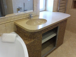 Countertop made of artificial stone in the bathroom photo
