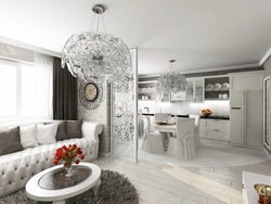 Design of a combined kitchen and living room in white