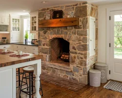 Kitchen with stove in a country house design photo