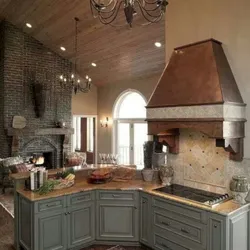 Kitchen with stove in a country house design photo
