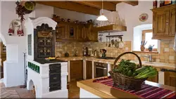 Kitchen with stove in a country house design photo