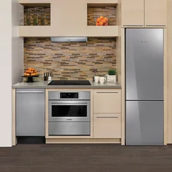 Freestanding refrigerator in the kitchen interior