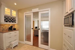 Photo of the door to the kitchen in the apartment