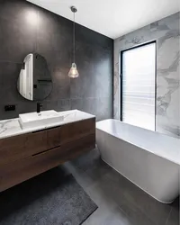 Concrete tiles in the bathroom interior photo