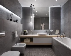 Bathroom design with gray washing machine