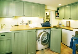 Interior Of A Small Kitchen With A Washing Machine