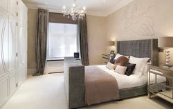 Wallpaper in beige tones in the interior photo for the bedroom