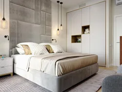 Bedroom design with gray bed and wardrobe