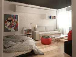 Bedroom design with bed and sofa in modern style