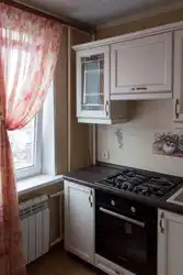 Kitchen with a column in Khrushchev layout and design photo