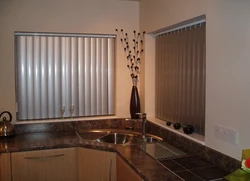 Vertical blinds photo in the kitchen interior