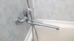 Photo of a water tap in the bathroom