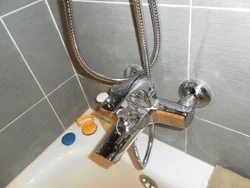 Photo Of A Water Tap In The Bathroom