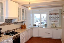 Kitchen design in the corner window