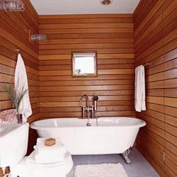 Bathroom With Toilet In A Wooden House Design Photo
