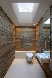 Bathroom with toilet in a wooden house design photo