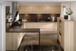 Photo of a kitchen with bar counters all made of wood
