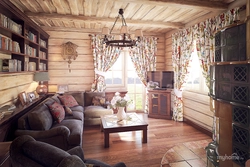 Design of a living room in a country house in a wooden house