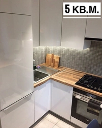 Design of a small kitchen photo sq m with a refrigerator
