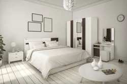 Bright bedroom with white furniture photo